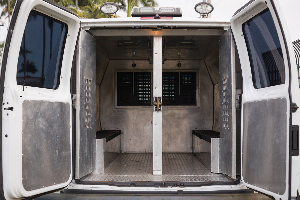 rear view of a transport van with doors open